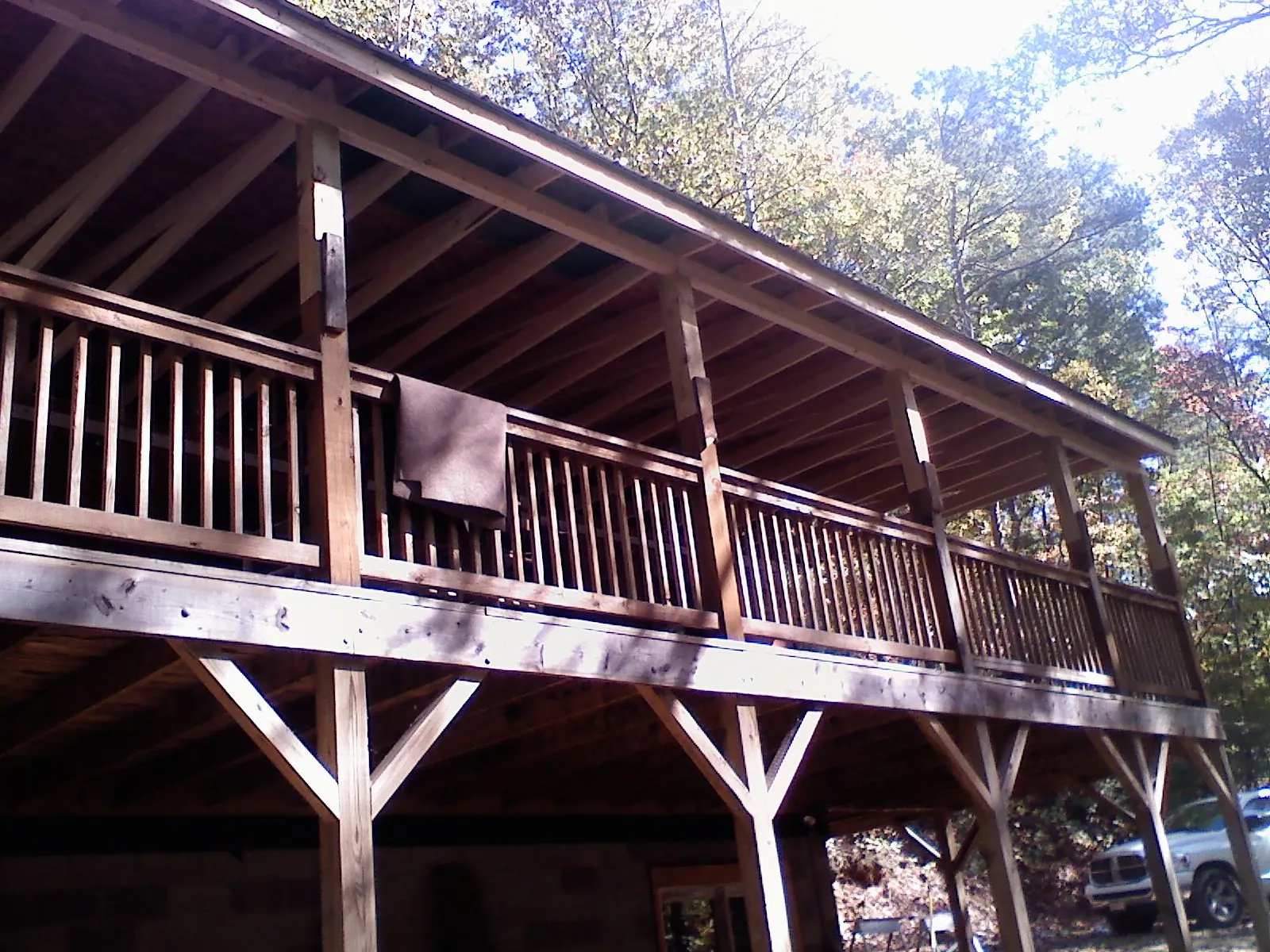 Timber framing under a new elevated porch and deck — Roof Leak Repair in Gladwyne by Roofing Brothers